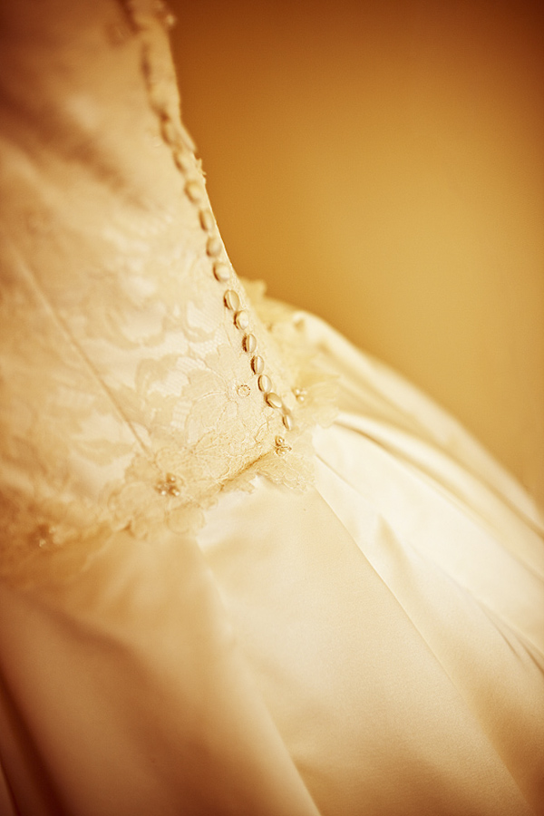 Wedding dress embellishments wedding photo by top Florida based wedding photographers Gandy